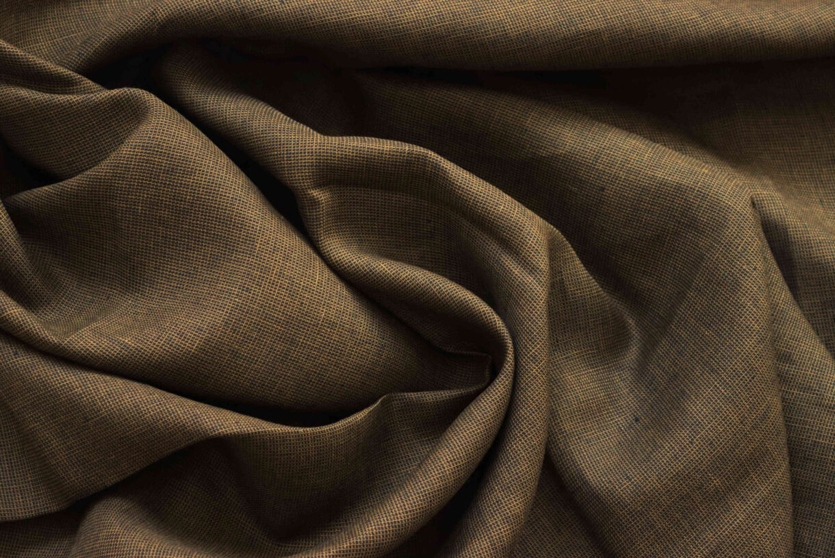 Black and Monk’s Robe Twill Linen – Light Two-Tone Fabric Black and Monk’s Robe twill linen fabric, lightweight with subtle diagonal weave for clothing and home décor