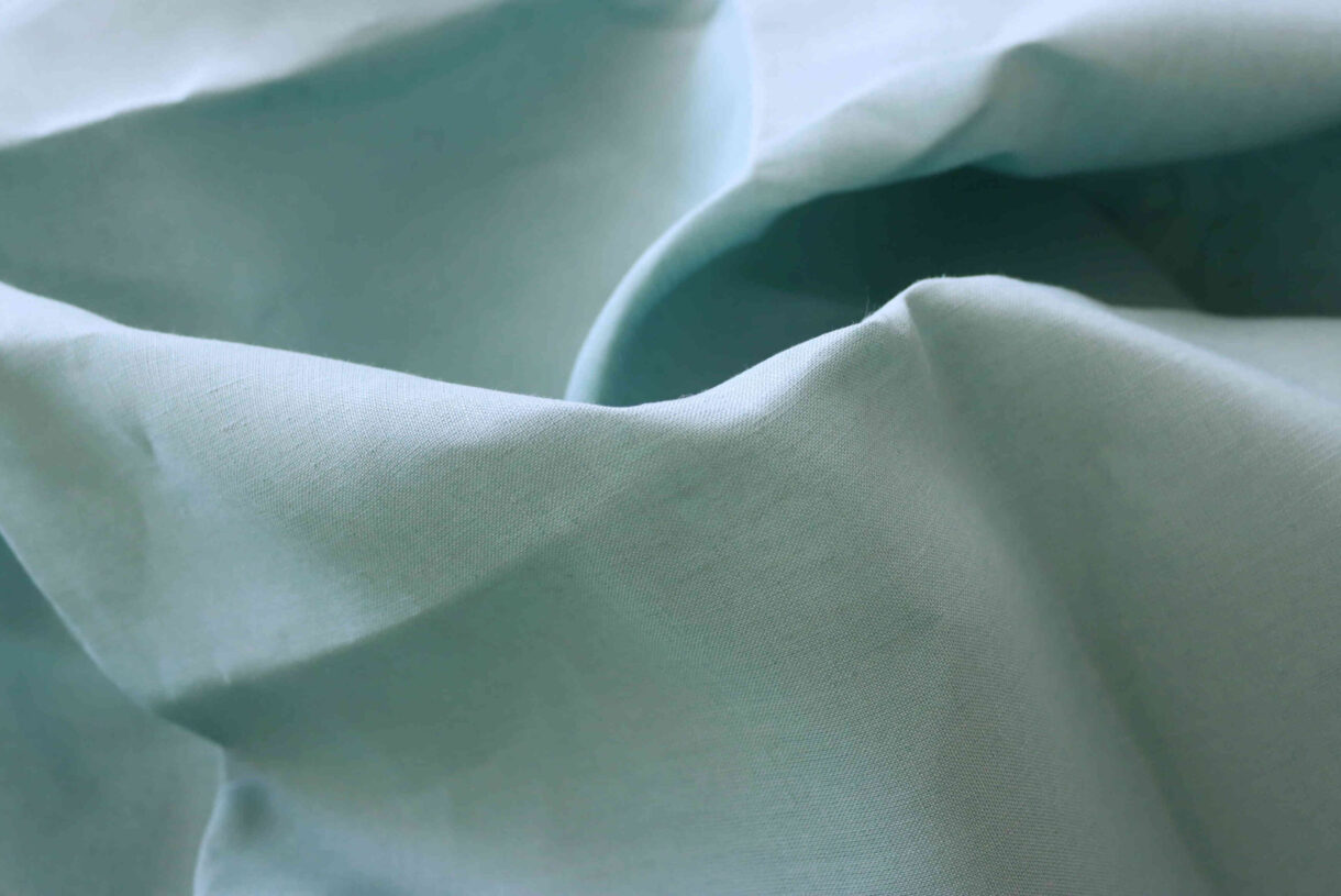 Canton Hemp – Lightweight Breathable Sustainable Fabric Canton hemp fabric, lightweight eco-friendly textile in soft natural tone