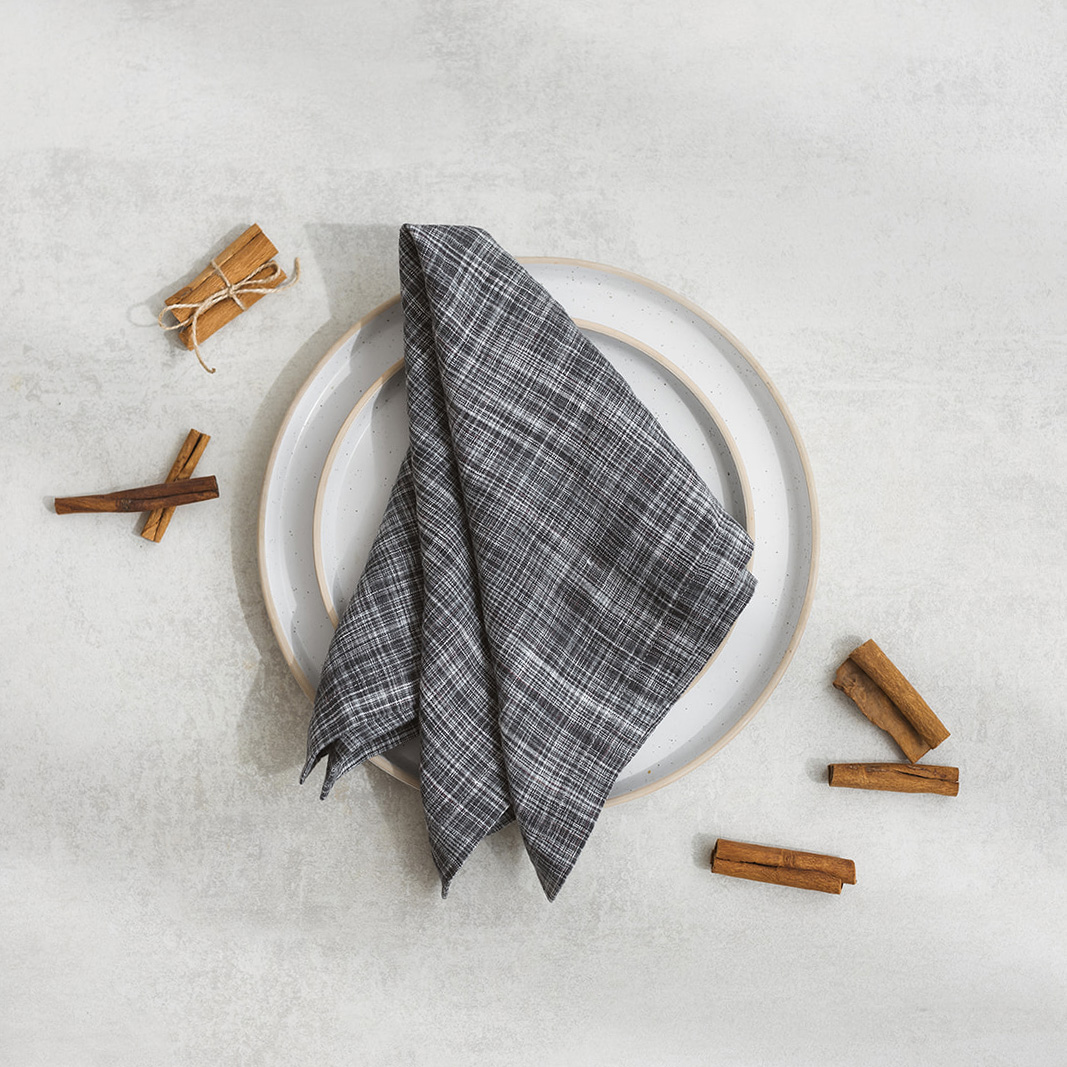 Linen napkin Grey mist Set of two 100% linen napkins, neatly folded on a neutral table surface.