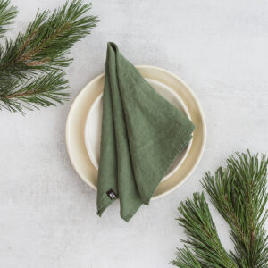 Set of two 100% linen napkins, neatly folded on a neutral table surface.