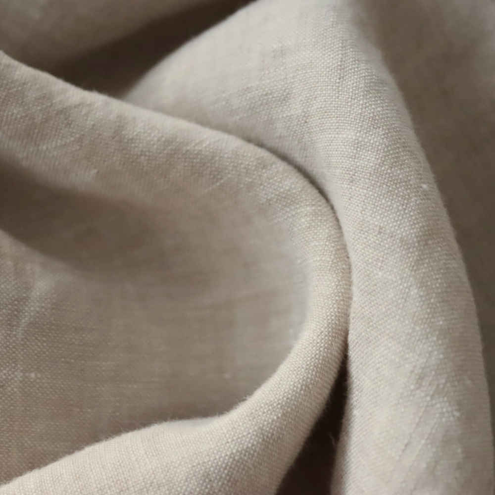 100% Linen Wide Fabric in Natural Melange 160gsm showcasing the lightweight texture and subtle rustic charm.